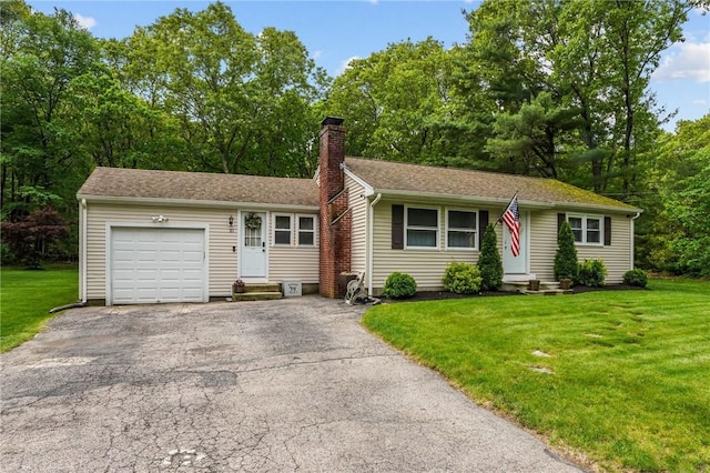 10 Bigelow Rd, Johnston, RI 02919 - view of front of home with entry steps, a garage, a chimney, asphalt driveway, and a front lawn