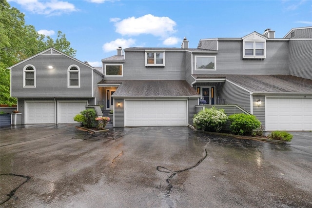 5390 Post Rd Unit 9, Warwick, RI 02818 - view of front of property featuring an attached garage and driveway