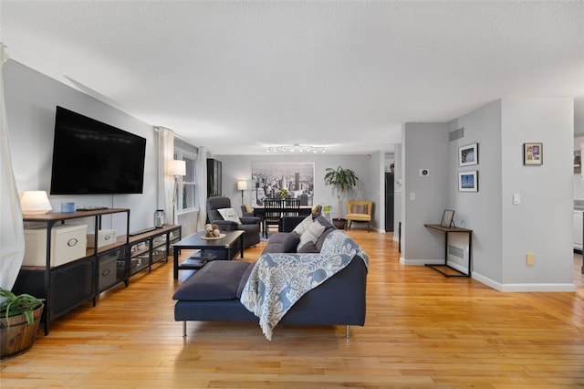 5390 Post Rd Unit 9, Warwick, RI 02818 - living room featuring light wood-type flooring and baseboards
