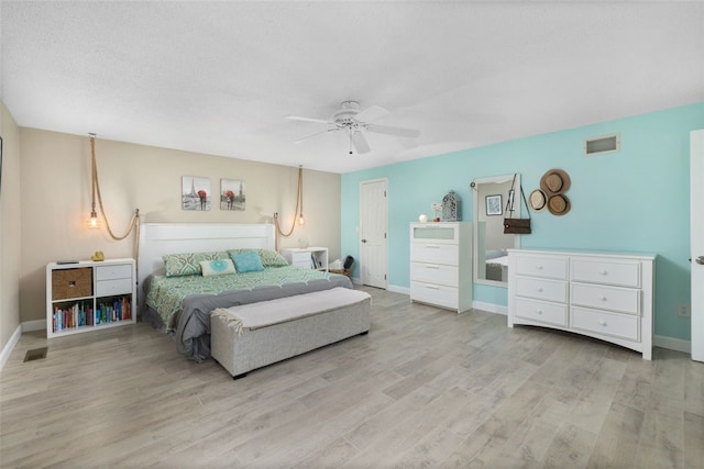 5390 Post Rd Unit 9, Warwick, RI 02818 - bedroom with wood finished floors, baseboards, and a ceiling fan