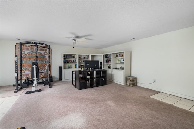 5390 Post Rd Unit 9, Warwick, RI 02818 - living room featuring ceiling fan, light colored carpet, a desk, and light tile patterned floors