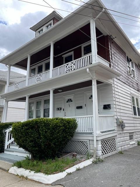 342 Union Ave, Cranston, RI 02909 - view of front facade featuring a balcony and a porch