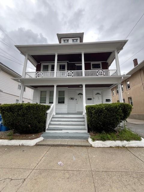 342 Union Ave, Cranston, RI 02909 - american foursquare style home with a balcony and covered porch