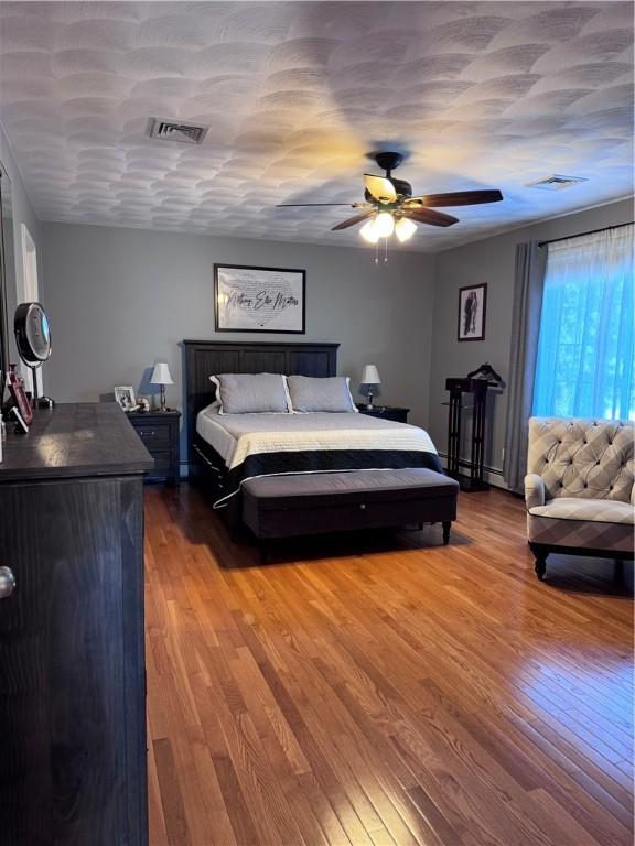 60 Farm Dr, Cumberland, RI 02864 - bedroom featuring wood finished floors, ceiling fan, and baseboards