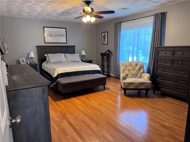 60 Farm Dr, Cumberland, RI 02864 - bedroom with light wood finished floors and a ceiling fan