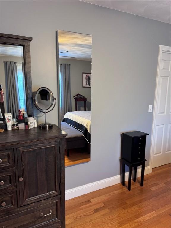 60 Farm Dr, Cumberland, RI 02864 - bedroom with light wood-style flooring and baseboards