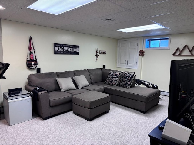 60 Farm Dr, Cumberland, RI 02864 - carpeted living area with a paneled ceiling and a baseboard heating unit