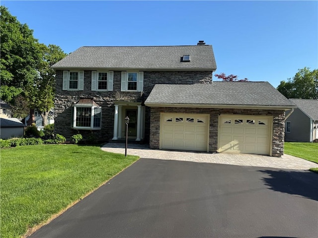 60 Farm Dr, Cumberland, RI 02864 - view of front of property with a garage, asphalt driveway, a front lawn, and stone siding