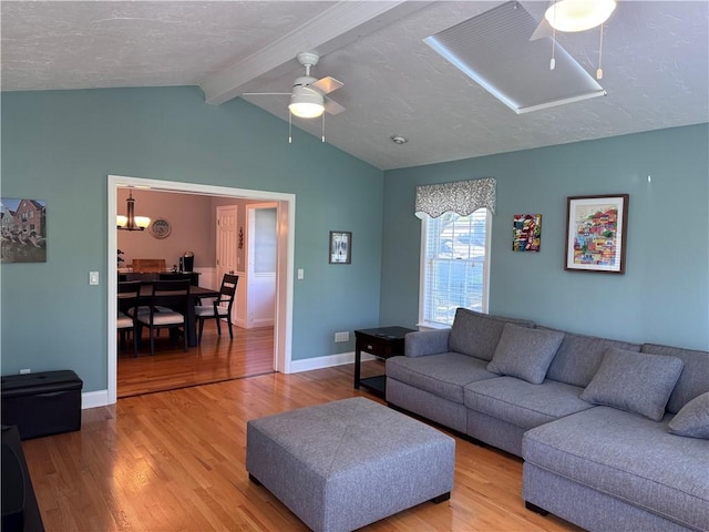 60 Farm Dr, Cumberland, RI 02864 - living room featuring a ceiling fan, light wood-type flooring, and baseboards