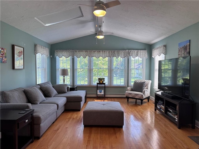 60 Farm Dr, Cumberland, RI 02864 - living room featuring wood finished floors, a textured ceiling, vaulted ceiling, a ceiling fan, and a baseboard heating unit