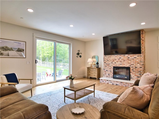 1 Hinter Way, Little Compton, RI 02837 - living area featuring wood finished floors, recessed lighting, a fireplace, and baseboards