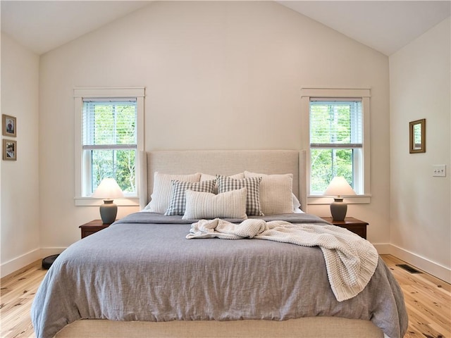 1 Hinter Way, Little Compton, RI 02837 - bedroom featuring multiple windows, wood finished floors, baseboards, and high vaulted ceiling