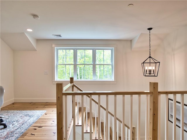 1 Hinter Way, Little Compton, RI 02837 - hallway featuring hardwood / wood-style flooring, baseboards, recessed lighting, an upstairs landing, and a chandelier