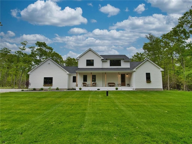 1 Hinter Way, Little Compton, RI 02837 - view of front of home featuring a porch, a front lawn, and roof with shingles
