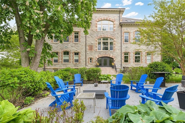 426 Spring St Unit B101, Newport, RI 02840 - view of patio featuring an outdoor fire pit and french doors