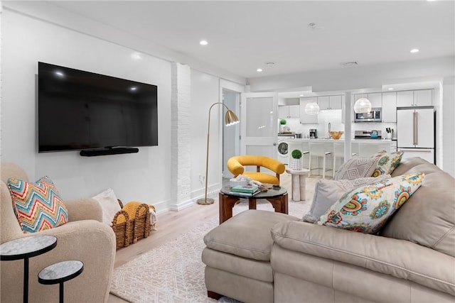 426 Spring St Unit B101, Newport, RI 02840 - living area featuring light wood-style floors, recessed lighting, and baseboards