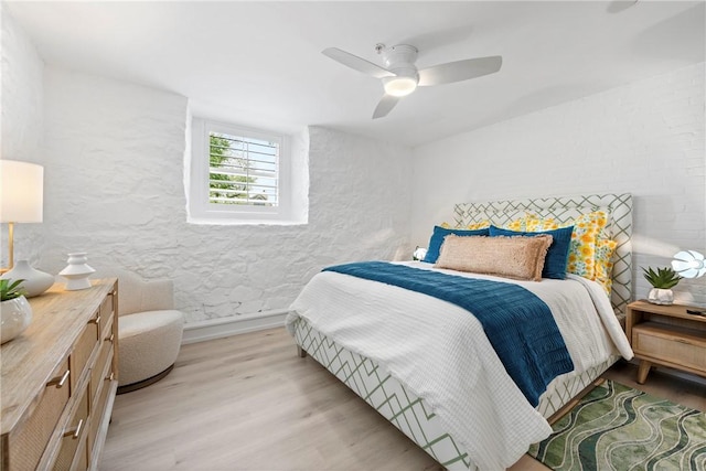 426 Spring St Unit B101, Newport, RI 02840 - bedroom with light wood-style flooring, baseboards, and a ceiling fan