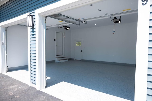 9 Chase Ln, Lincoln, RI 02865 - garage featuring a garage door opener