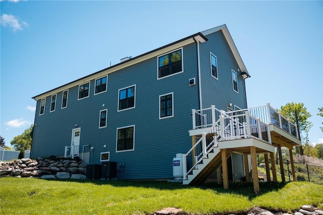 9 Chase Ln, Lincoln, RI 02865 - back of property featuring stairs and a deck