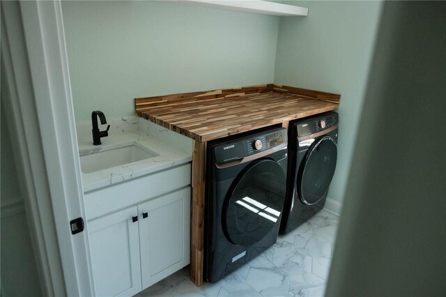 9 Chase Ln, Lincoln, RI 02865 - washroom featuring washer and dryer, light marble finish floors, and a sink
