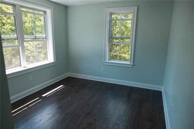 9 Chase Ln, Lincoln, RI 02865 - unfurnished room with baseboards and dark wood-type flooring