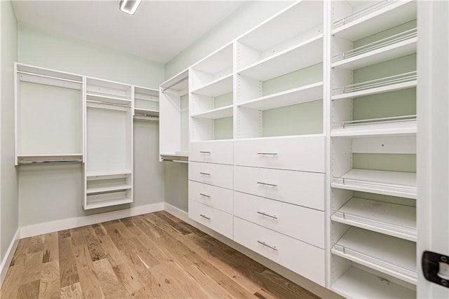 125 Fairview Ave, Hopkinton, RI 02832 - walk in closet featuring wood finished floors