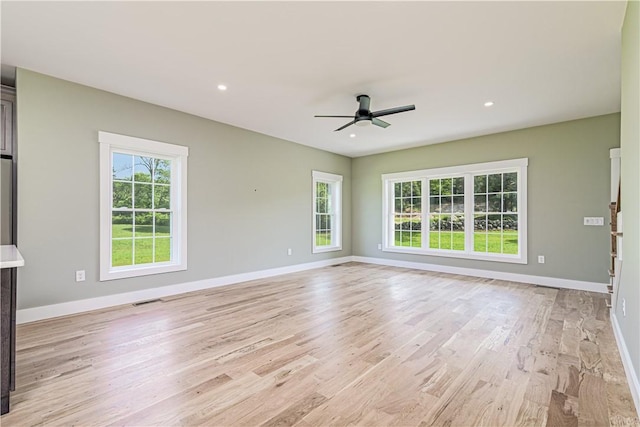 125 Fairview Ave, Hopkinton, RI 02832 - empty room with healthy amount of natural light, a ceiling fan, light wood-style floors, and recessed lighting