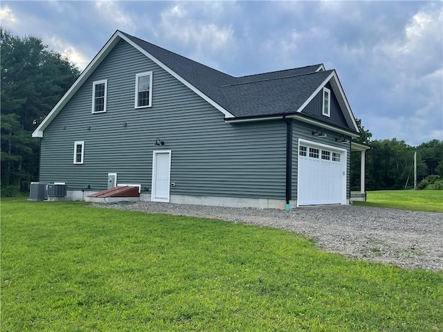 125 Fairview Ave, Hopkinton, RI 02832 - view of home's exterior featuring roof with shingles, a yard, and gravel driveway