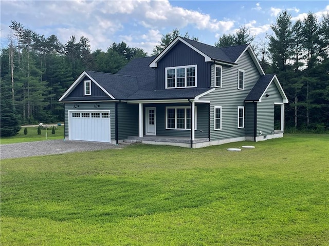 125 Fairview Ave, Hopkinton, RI 02832 - view of front of property featuring a garage, a porch, driveway, a front yard, and a shingled roof