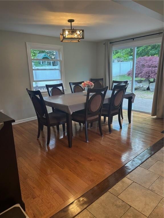 21 Baldwin Rd, Warwick, RI 02886 - dining area featuring healthy amount of natural light, a chandelier, and light wood finished floors