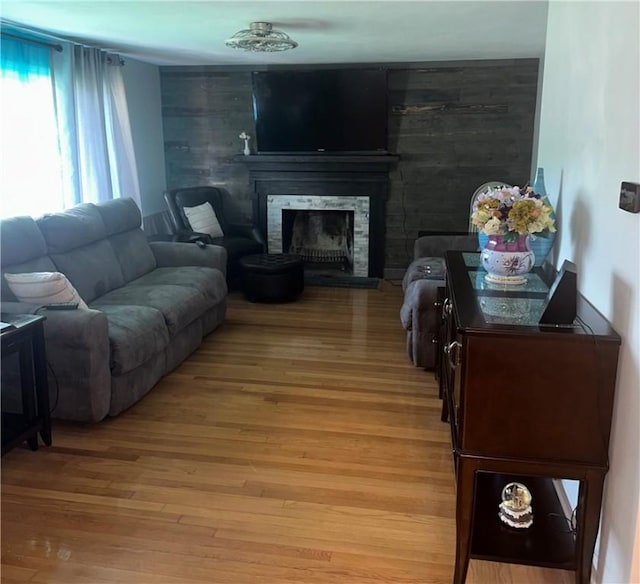 21 Baldwin Rd, Warwick, RI 02886 - living area with light wood-style floors and a fireplace