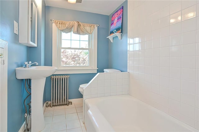 822 Cottage St, Pawtucket, RI 02861 - full bath with radiator, a garden tub, tile patterned floors, toilet, and baseboards
