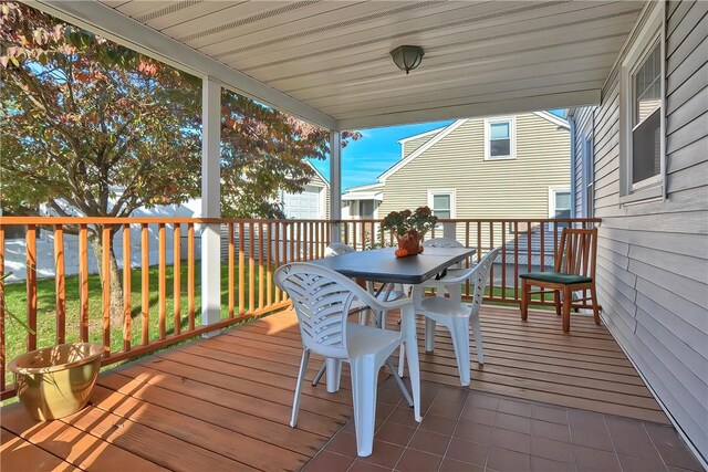 822 Cottage St, Pawtucket, RI 02861 - wooden terrace with outdoor dining area