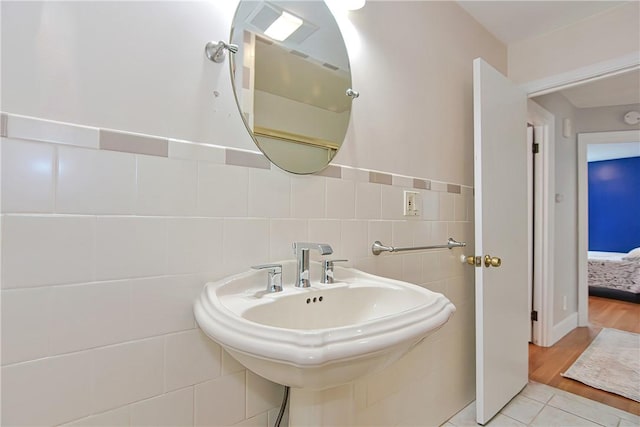 822 Cottage St, Pawtucket, RI 02861 - bathroom featuring a sink, connected bathroom, and tile patterned floors