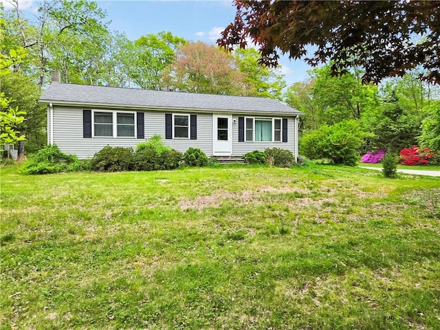 294 Railroad Ave, North Kingstown, RI 02874 - ranch-style house with a chimney, entry steps, and a front lawn
