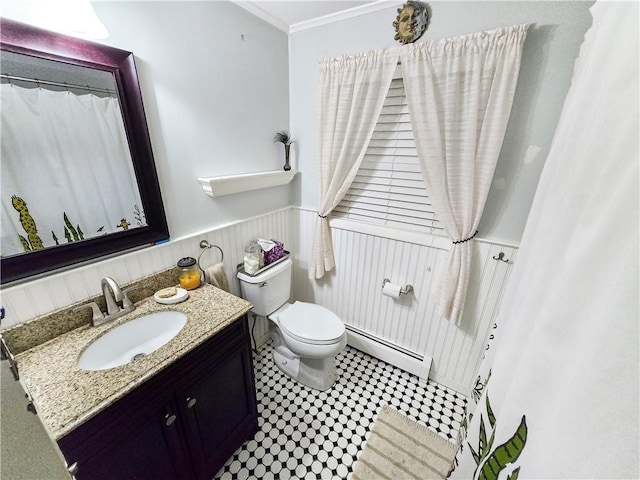 294 Railroad Ave, North Kingstown, RI 02874 - full bath with baseboard heating, toilet, vanity, a wainscoted wall, and ornamental molding