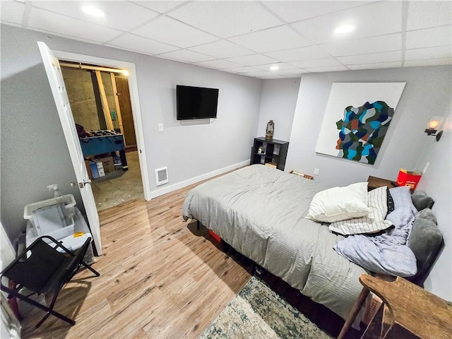 294 Railroad Ave, North Kingstown, RI 02874 - bedroom with light wood-type flooring, a drop ceiling, baseboards, and recessed lighting