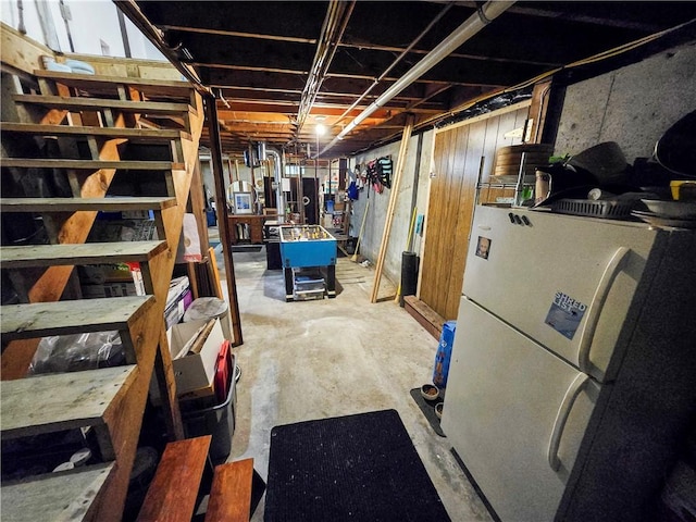 294 Railroad Ave, North Kingstown, RI 02874 - unfinished below grade area featuring freestanding refrigerator