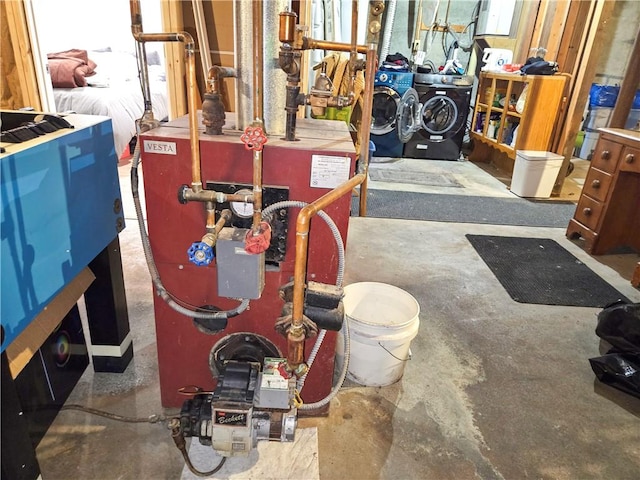 294 Railroad Ave, North Kingstown, RI 02874 - basement with washer and clothes dryer and a heating unit