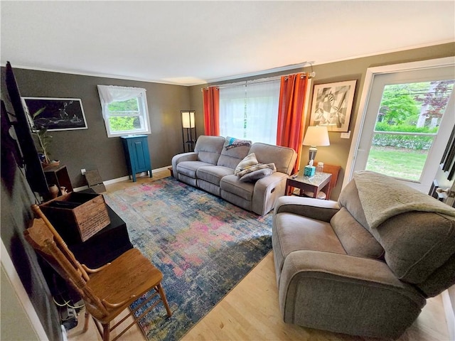 294 Railroad Ave, North Kingstown, RI 02874 - living room featuring wood finished floors and ornamental molding