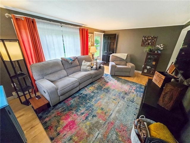 294 Railroad Ave, North Kingstown, RI 02874 - living area with wood finished floors, crown molding, and baseboards