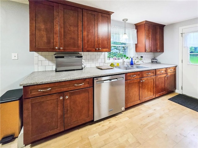 294 Railroad Ave, North Kingstown, RI 02874 - kitchen with dishwasher, a sink, healthy amount of natural light, and backsplash