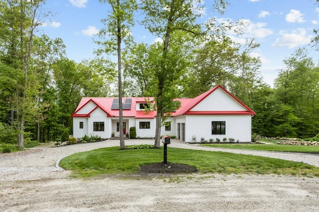45 Lloyd Bowen Ct, Glocester, RI 02814 - modern farmhouse with curved driveway, metal roof, and a front lawn