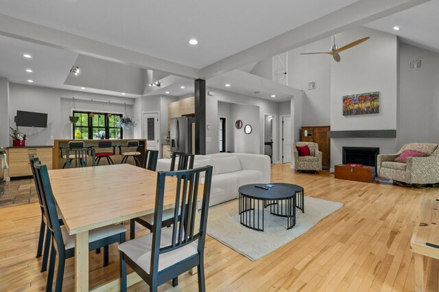 45 Lloyd Bowen Ct, Glocester, RI 02814 - dining area featuring light wood-style flooring, recessed lighting, a fireplace, and ceiling fan
