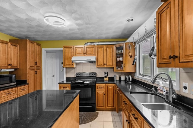 53 Morgan Ct, North Kingstown, RI 02852 - kitchen featuring black / electric stove, under cabinet range hood, brown cabinets, and stainless steel microwave