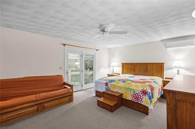 53 Morgan Ct, North Kingstown, RI 02852 - carpeted bedroom featuring an AC wall unit, access to exterior, and a ceiling fan