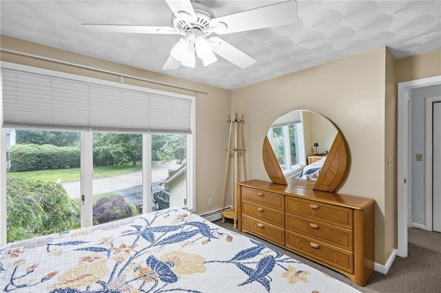 53 Morgan Ct, North Kingstown, RI 02852 - bedroom with carpet floors, a baseboard radiator, a ceiling fan, and access to exterior