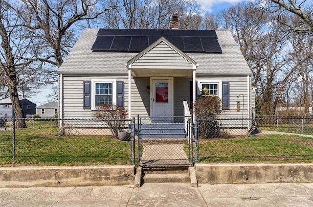 181 Vera St, Warwick, RI 02886 - view of front facade with a gate, a chimney, roof with shingles, and roof mounted solar panels