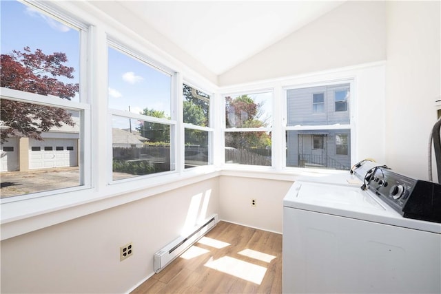130 Hunts Ave, Pawtucket, RI 02861 - washroom with a baseboard heating unit, light wood-type flooring, and washing machine and dryer