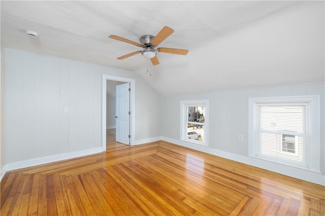 130 Hunts Ave, Pawtucket, RI 02861 - additional living space with vaulted ceiling, baseboards, ceiling fan, and light wood-style floors